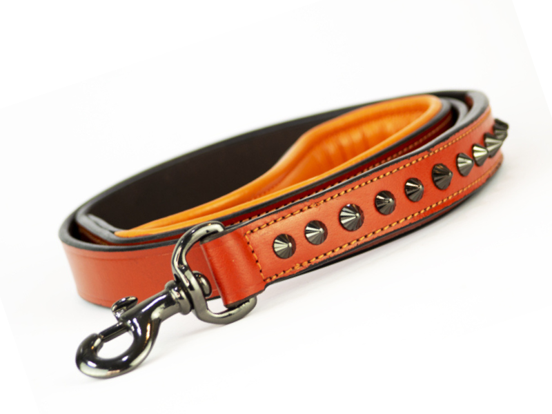 Side view of hand made orange leather leash