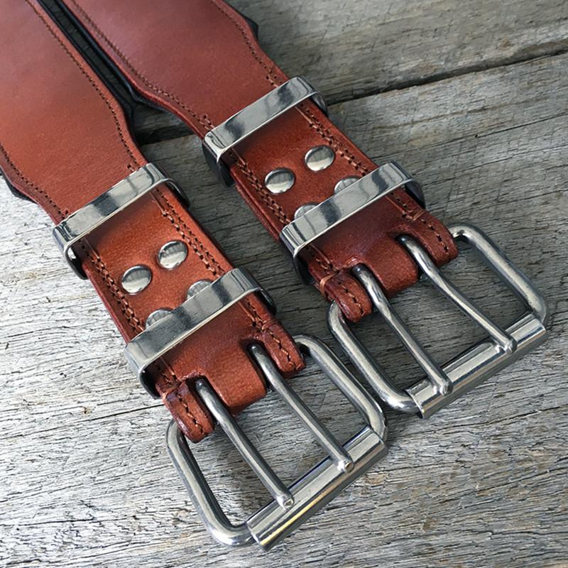 Handmade brown leather dog collar with reinforced steel rivets for extra safety for big dogs.
